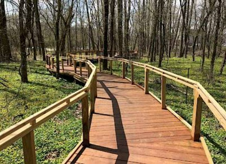 A wooden walkway through a wooded area in Oxford, Ohio.