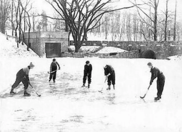 A group of people playing hockey on an ice rink in Oxford, Ohio.