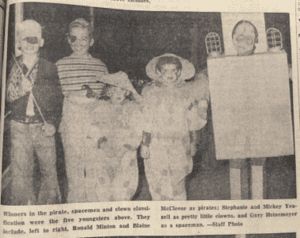 A Halloween newspaper article showcasing a group of people dressed up in costumes in Oxford, OH.