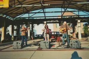 Photo of John Kogge and The Lonesome Strangers on stage at Uptown Memorial Park in Oxford, OH