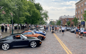 A line of Porsche's down High Street in Uptown Oxford