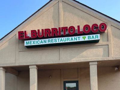 Exterior signage of "El Burrito Loco" on the facade of a building.