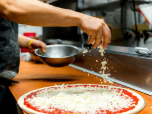 A person is preparing food in the kitchen.