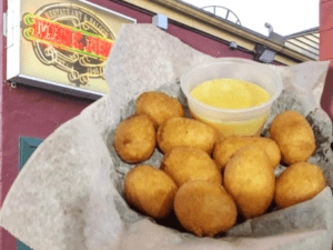 A bowl of mac bites outside of Mac & Joe's restaurant