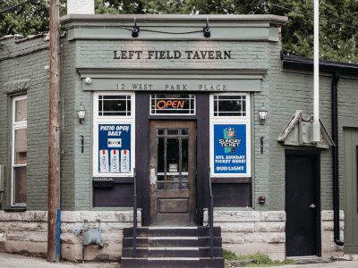 A left field tavern is located on the corner of main street.