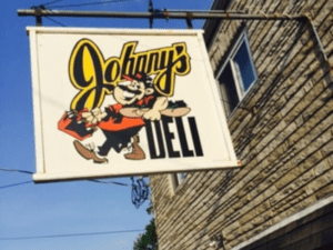 Johnny's Deli store front sign