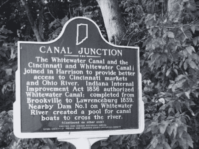 A black and white photo of a sign