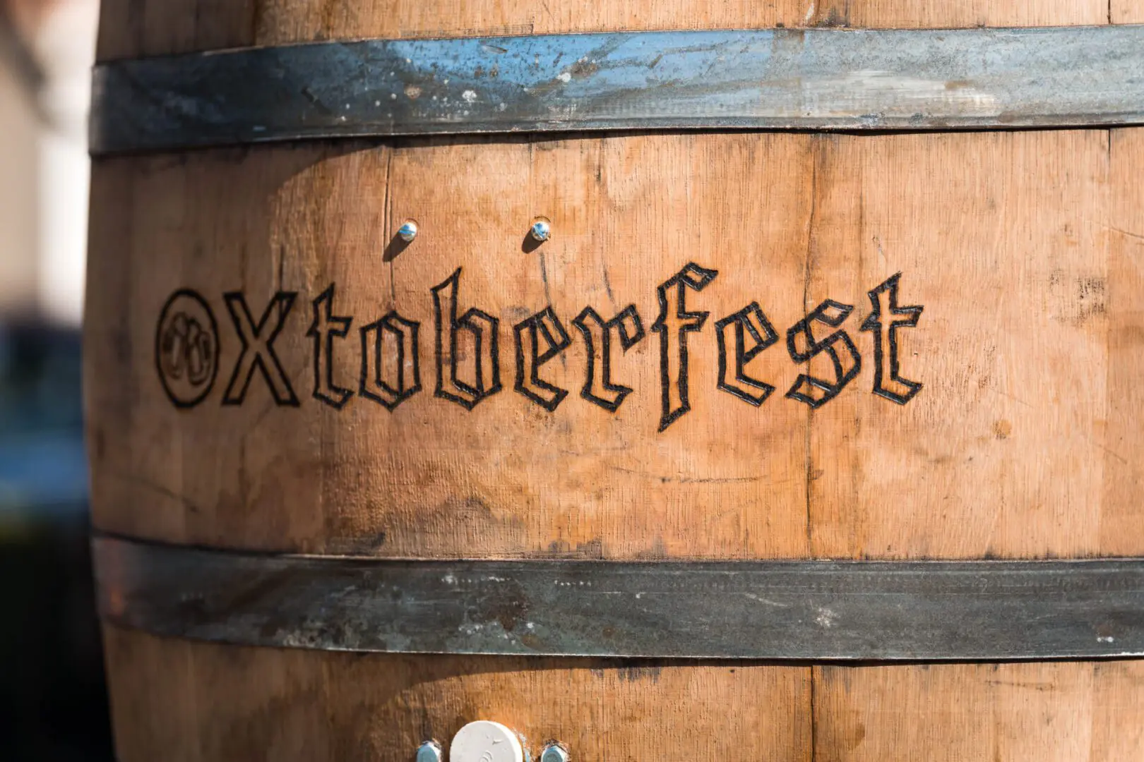 The word Oxtoberfest engraved into a barrel