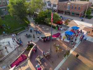 Event at Uptown Park, photo at Dr. Martin Luther King Memorial Park with canopy tents set up and people walking around