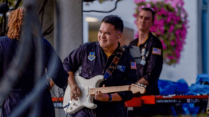 Air Force Band member playing electric guitar