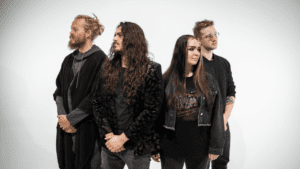 White Lighter members standing back-to-back for a photo