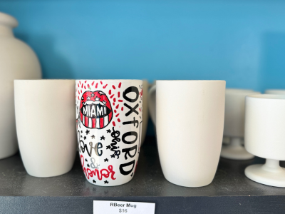 Ceramic root beer mug custom painted with "Oxford" on the side with red and white paint