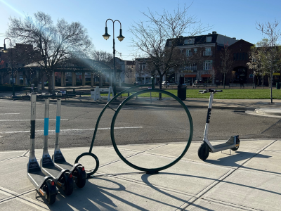 A row of Bird Scooters located on the corner of Park Place Uptown Oxford, OH