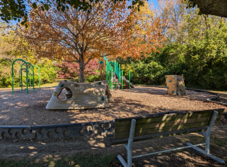 Leonard Park Playground with bench