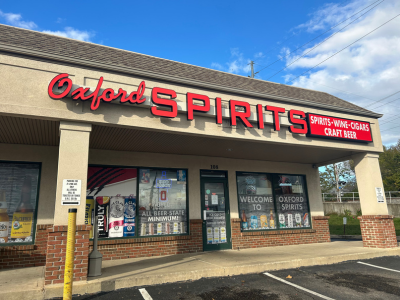 Exterior of Oxford Spirits with red letter sign