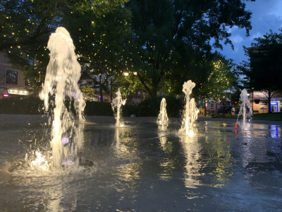 Water garden fountains light up at night at Martin Luther King Jr. Park