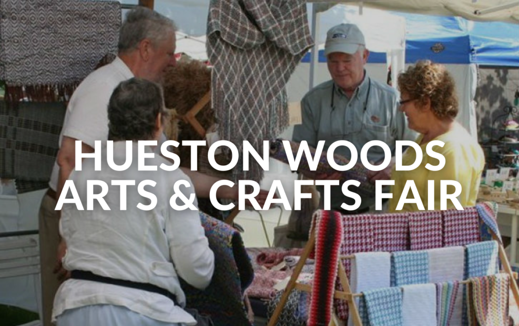 HUESTON WOODS ARTS & CRAFTS FAIR text over a photo of a vendor and shoppers talking at a booth.