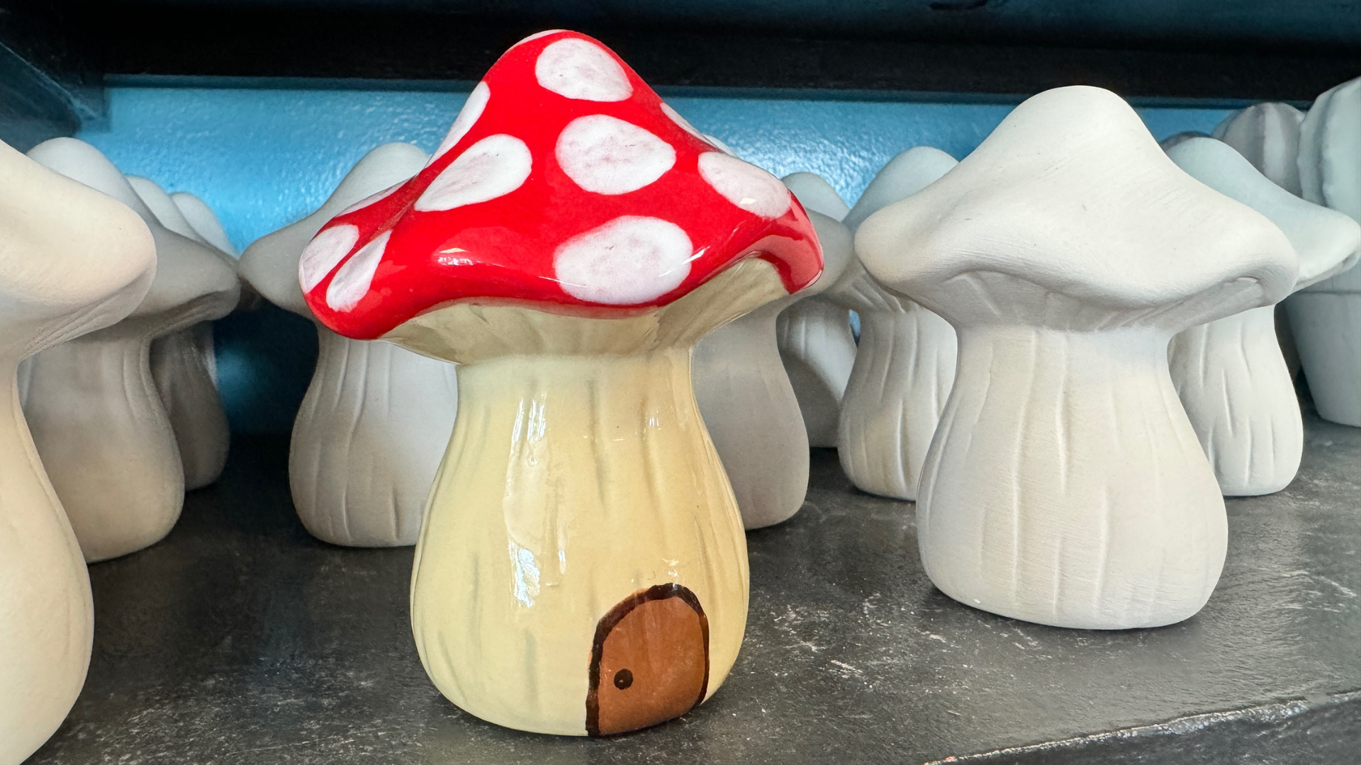 red and white polka dot painted mushroom