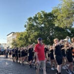 The Talawanda High School band marches down the red-bricked streets of Oxford during the Talawanda High School Homecoming parade.