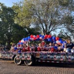 A group of younger cheerleaders rides on a float in the Talawanda HS Homecoming parade.