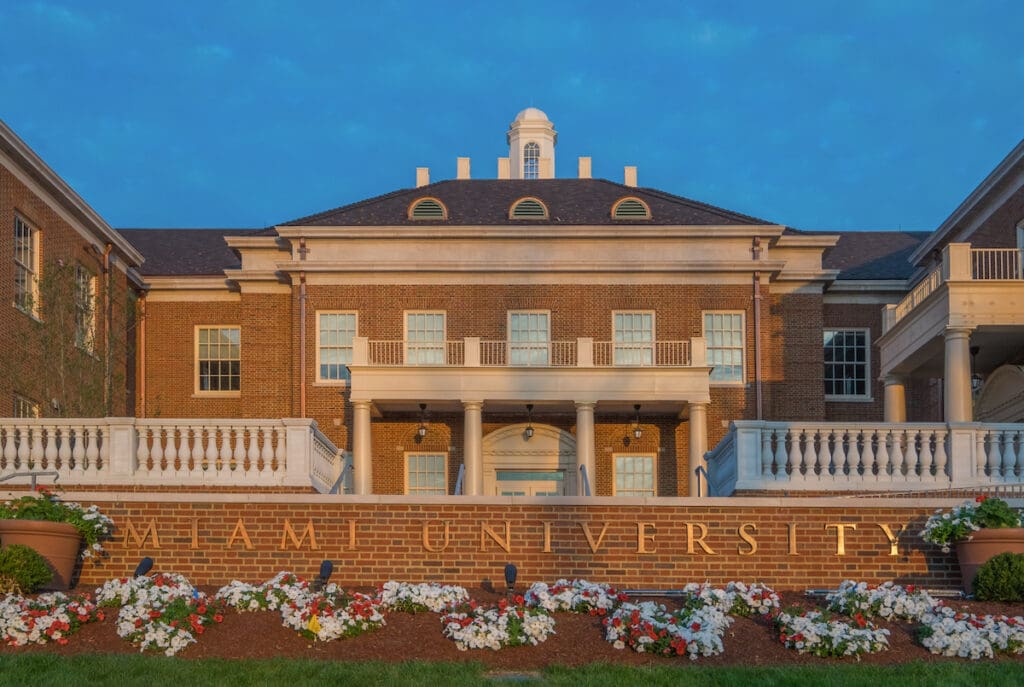 Image of building on Miami's campus with a sign that reads "Miami University."
