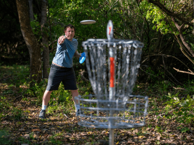 A person playing frisbee golf