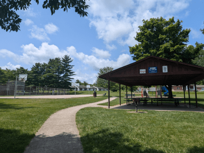 TRI Park picnic shelter, basketball court, tennis court, and playground