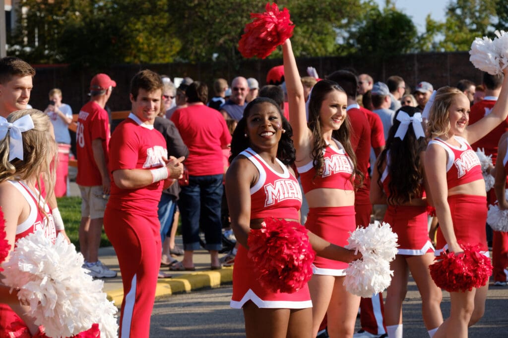 Miami University students and cheerleaders celebrate Homecoming.