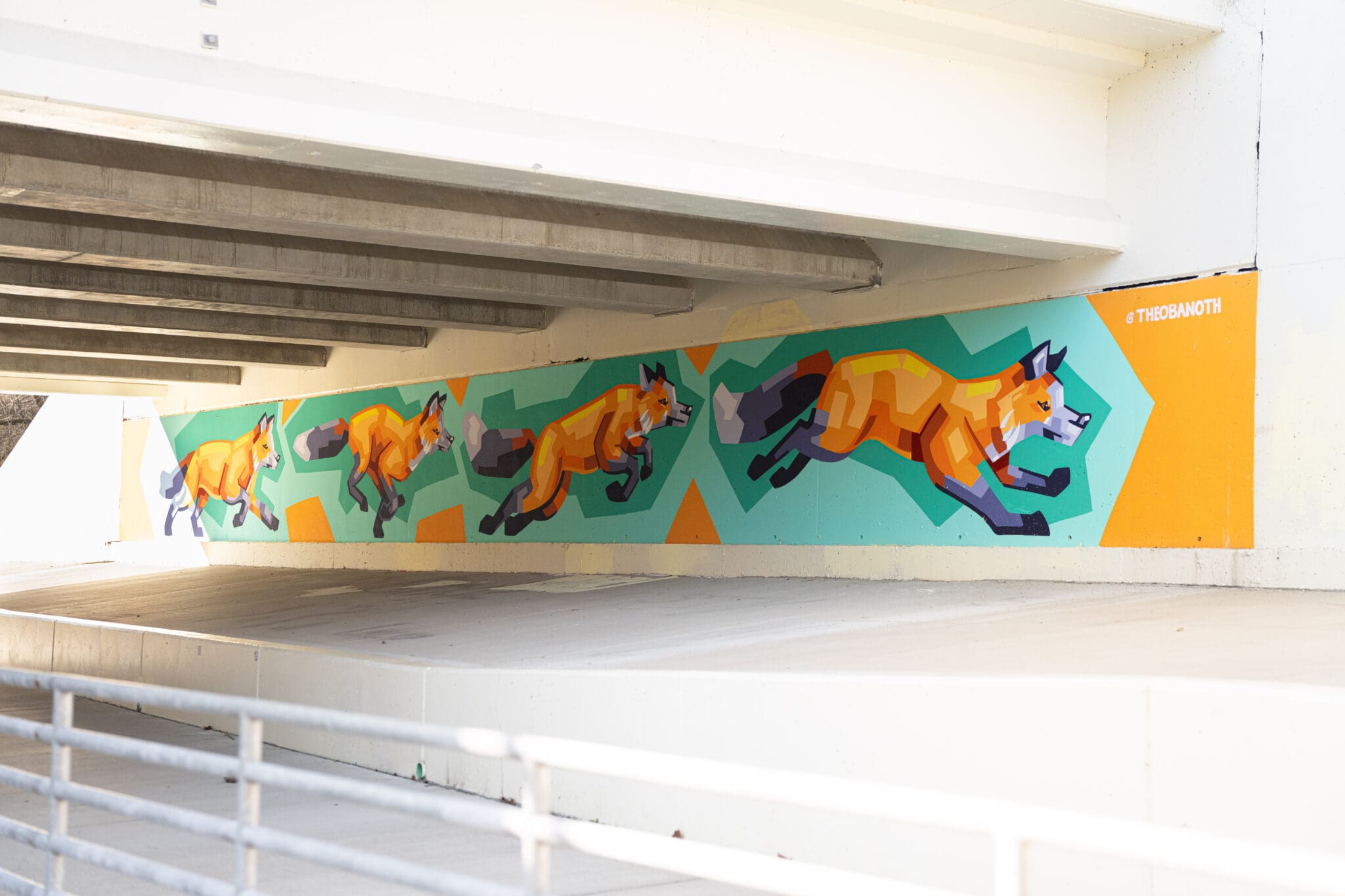 Fox mural under a bridge.