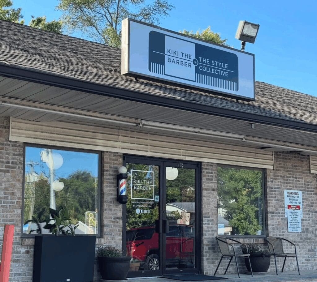 KIKI THE BARBER + The Style Collective exterior shop with store sign