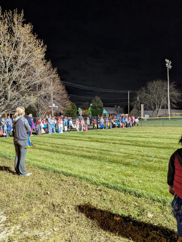 kids lined up for the night egg scramble