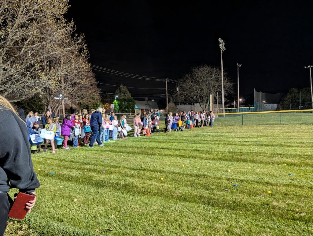 kids lined up for the night egg scramble