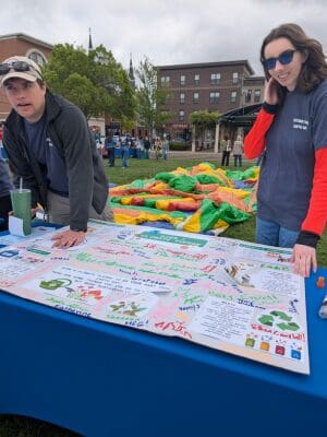 two students talking about sustainability at Oxford Memorial Park