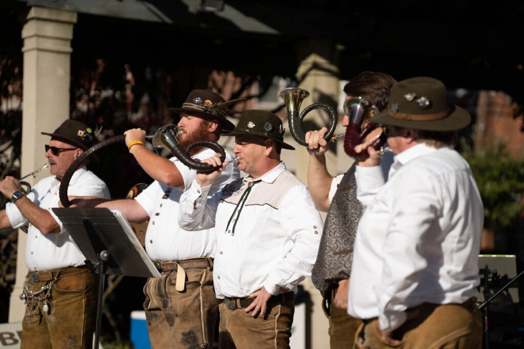 Traditional German musicians perform on the main stage at OXtoberfest.